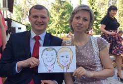 Татьяна и Андрей в красном галстуке получили свой шарж на свадьбе